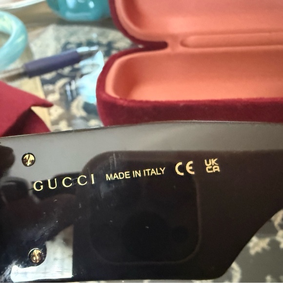 Gucci Black Sunglasses with Gold Logo